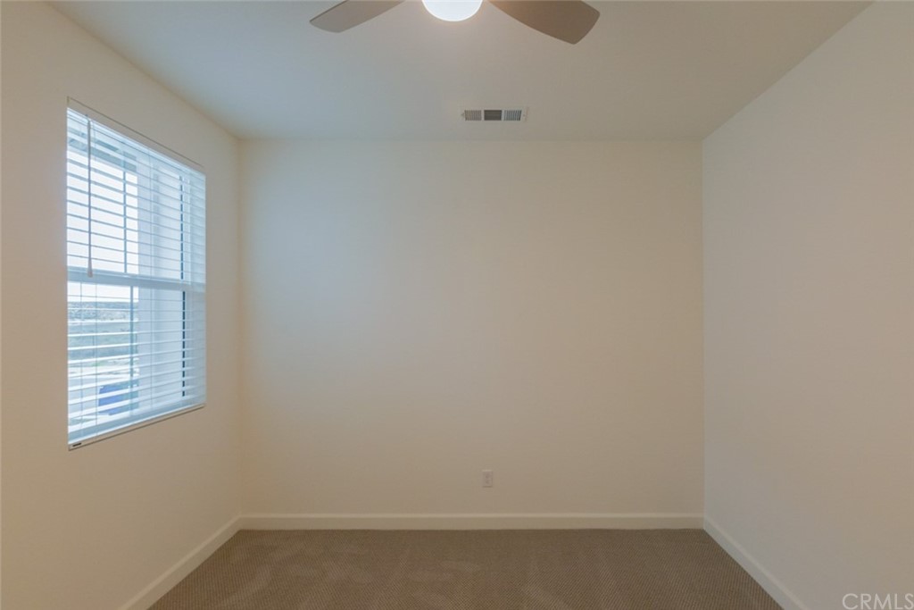 32151 Everview Temecula, CA 92591 - Photo 16 of 29 a room that has a window in it