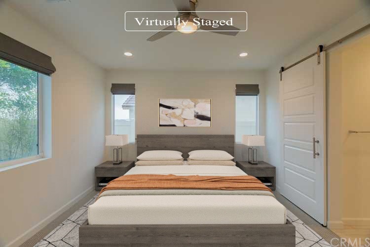 32151 Everview Temecula, CA 92591 - Photo 3 of 29 a bedroom with a large bed and a window