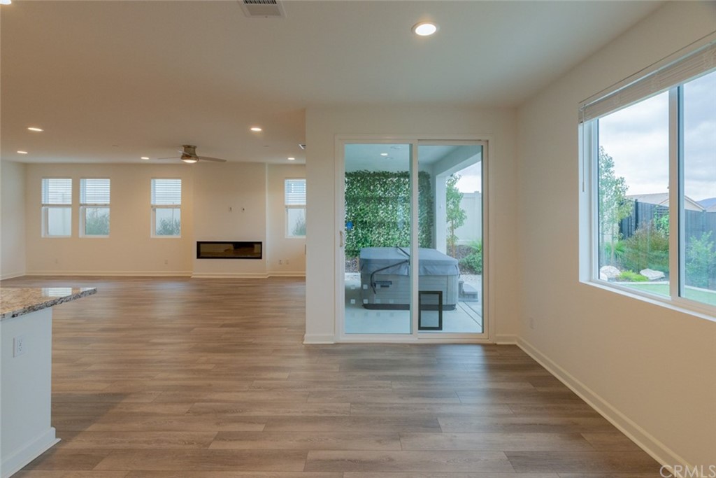 32151 Everview Temecula, CA 92591 - Photo 10 of 29 a view of a hallway with wooden floor and a large window