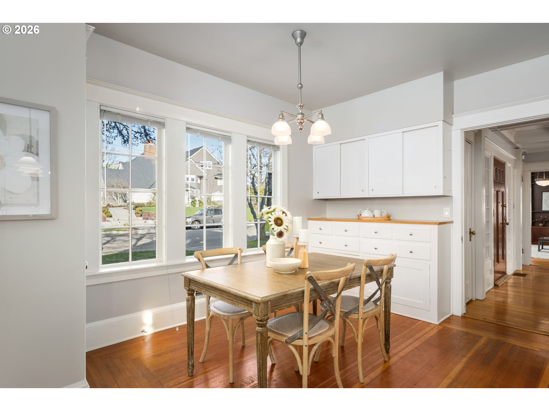 2806 Northeast Alameda Street Portland, OR 97212 - Photo 16 of 45 a view of a dining room with furniture wooden floor and chandelier