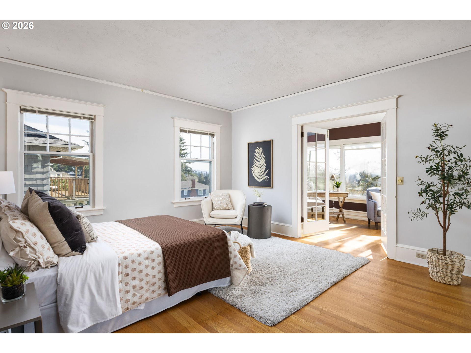 2806 Northeast Alameda Street Portland, OR 97212 - Photo 20 of 45 a bedroom with a large bed and a couch