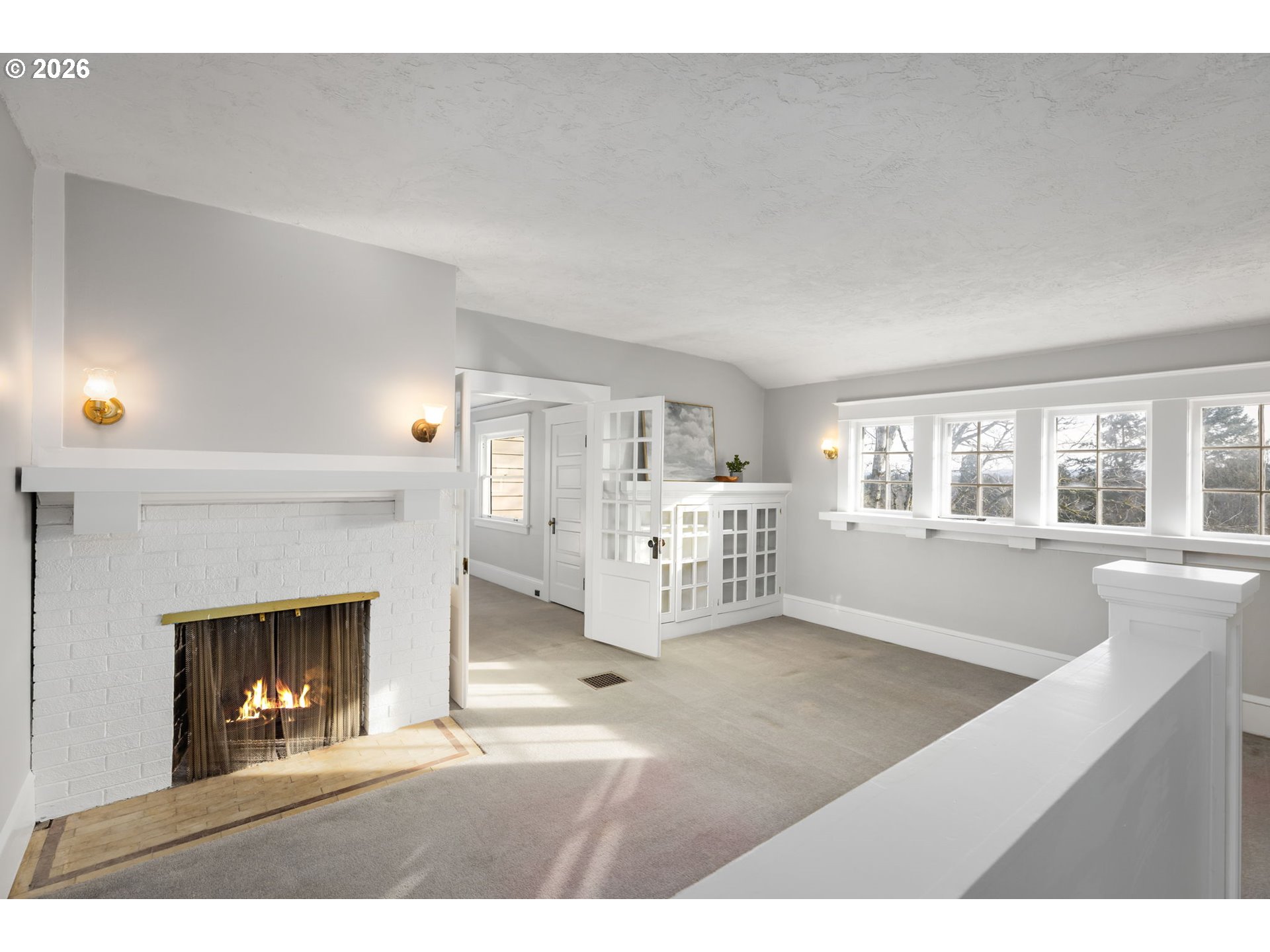 2806 Northeast Alameda Street Portland, OR 97212 - Photo 25 of 45 a living room with furniture and a fireplace