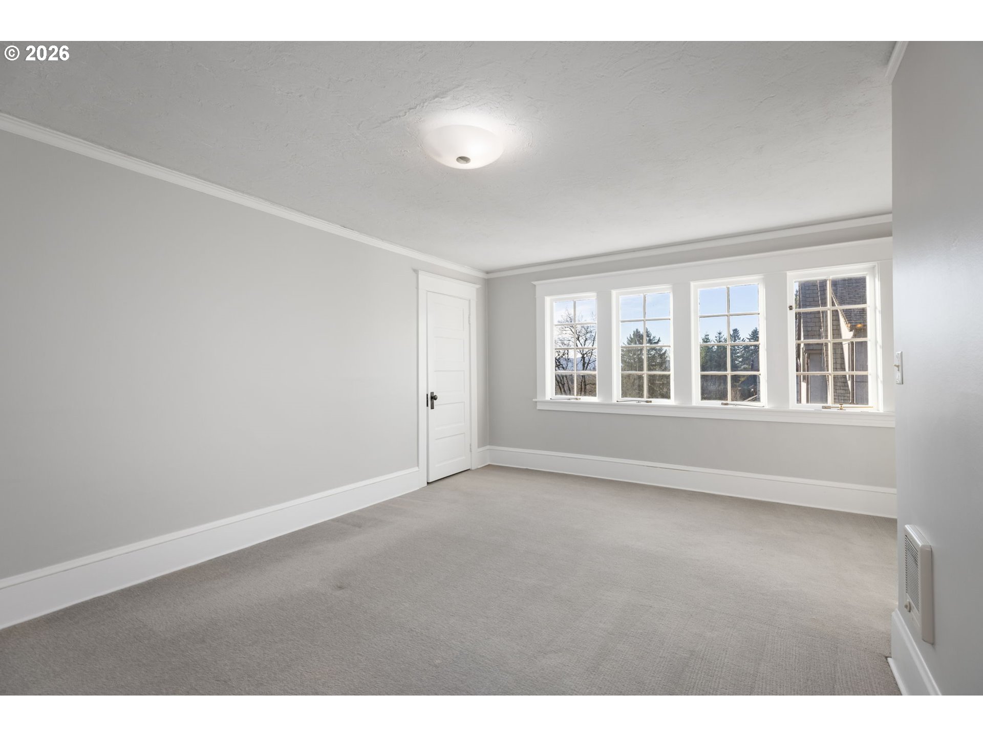 2806 Northeast Alameda Street Portland, OR 97212 - Photo 27 of 45 a view of an empty room with a window