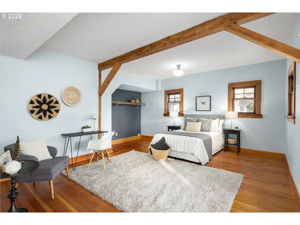 a bedroom with a bed and dresser