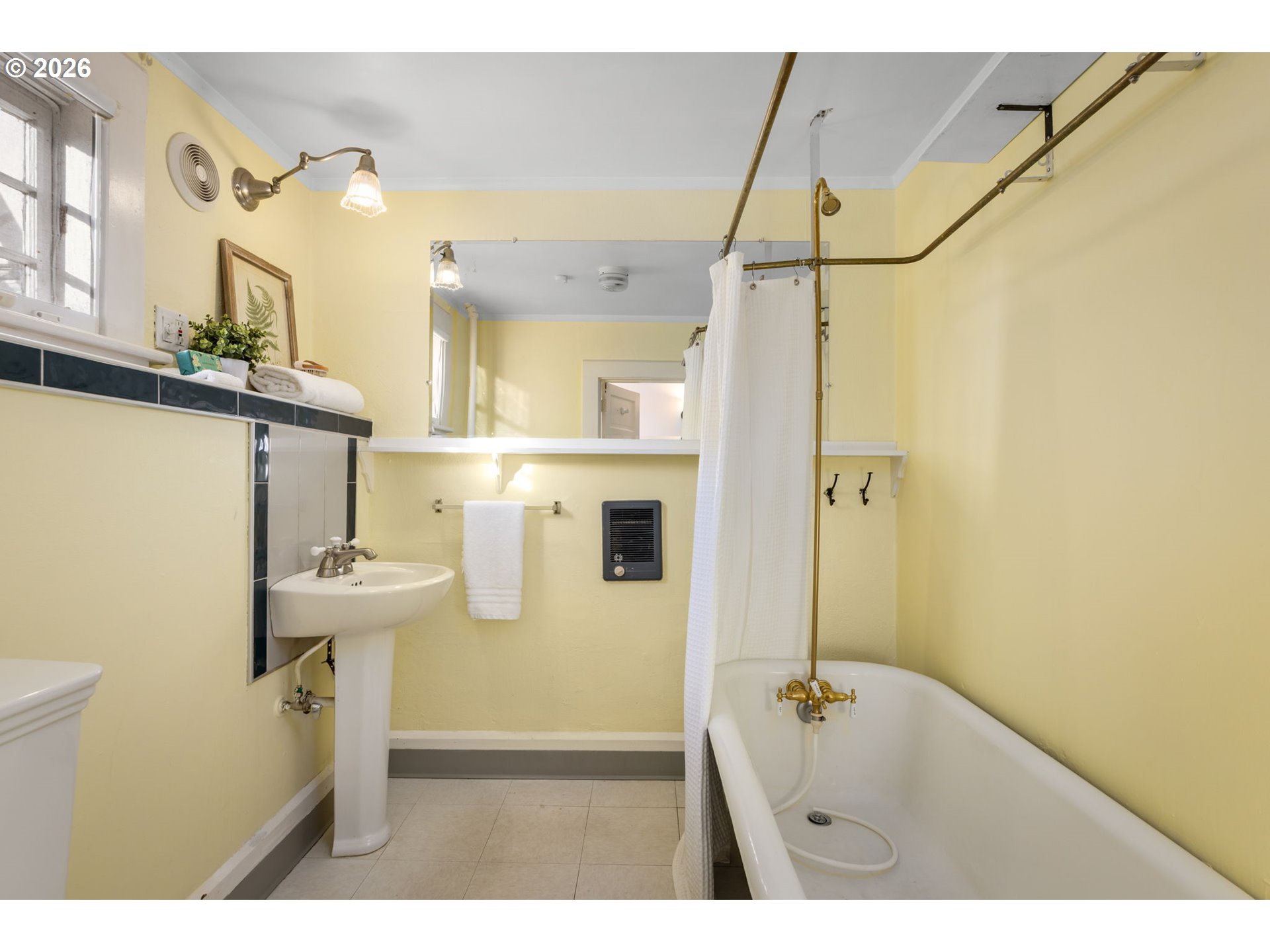 2806 Northeast Alameda Street Portland, OR 97212 - Photo 36 of 45 a bathroom with a sink a toilet and shower