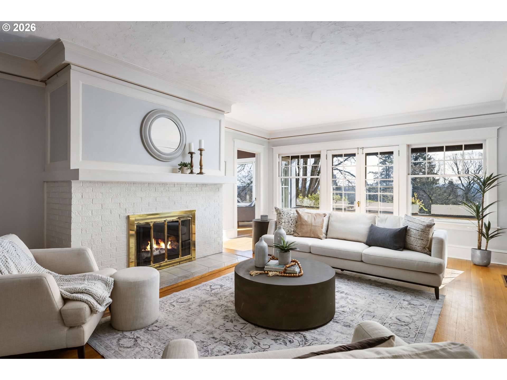2806 Northeast Alameda Street Portland, OR 97212 - Photo 6 of 45 a living room with furniture and a fireplace