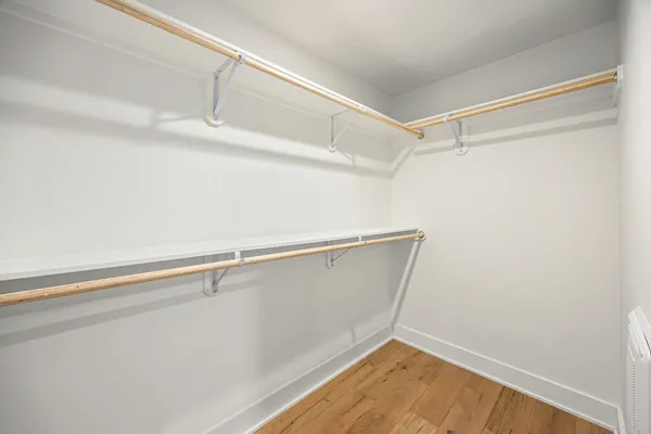 a view of a room with racks on the wall