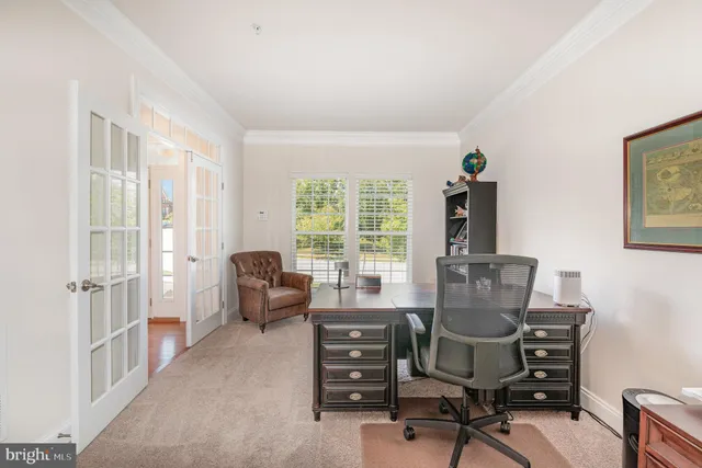 a workspace with furniture and a window