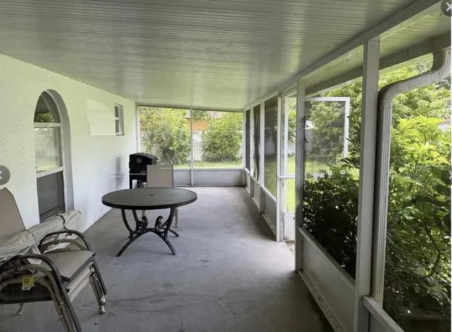 a view of a livingroom with furniture and window