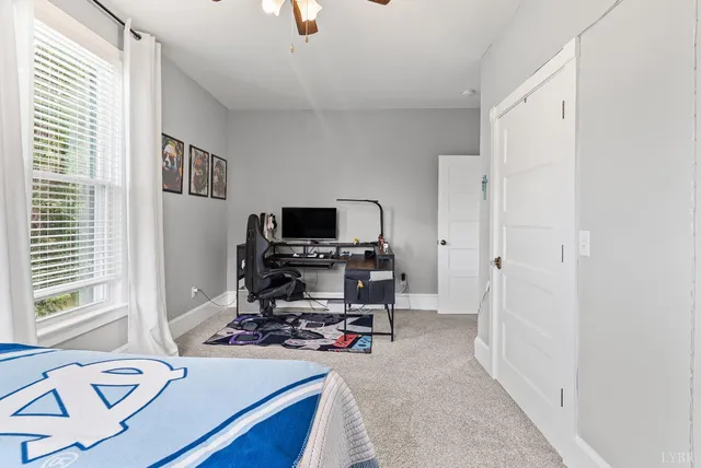a kitchen with stainless steel appliances a stove a sink and a refrigerator