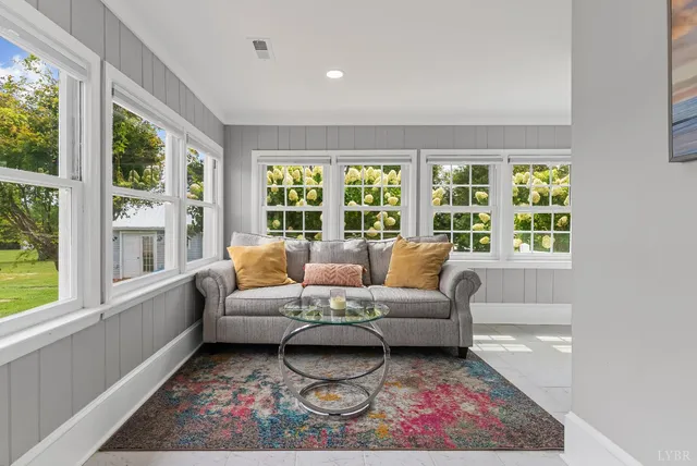 a bathroom with a sink vanity mirror and toilet