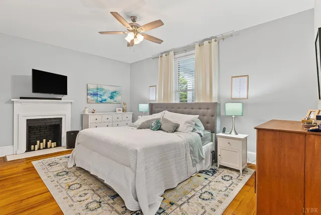 a bedroom with a bed and furniture