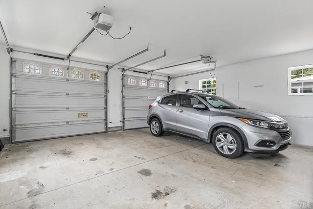 a view of a house with a backyard porch and sitting area