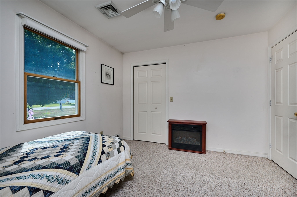 43 Loudville Road Easthampton, MA 01027 - Photo 16 of 34 a bed room with a bed and a window