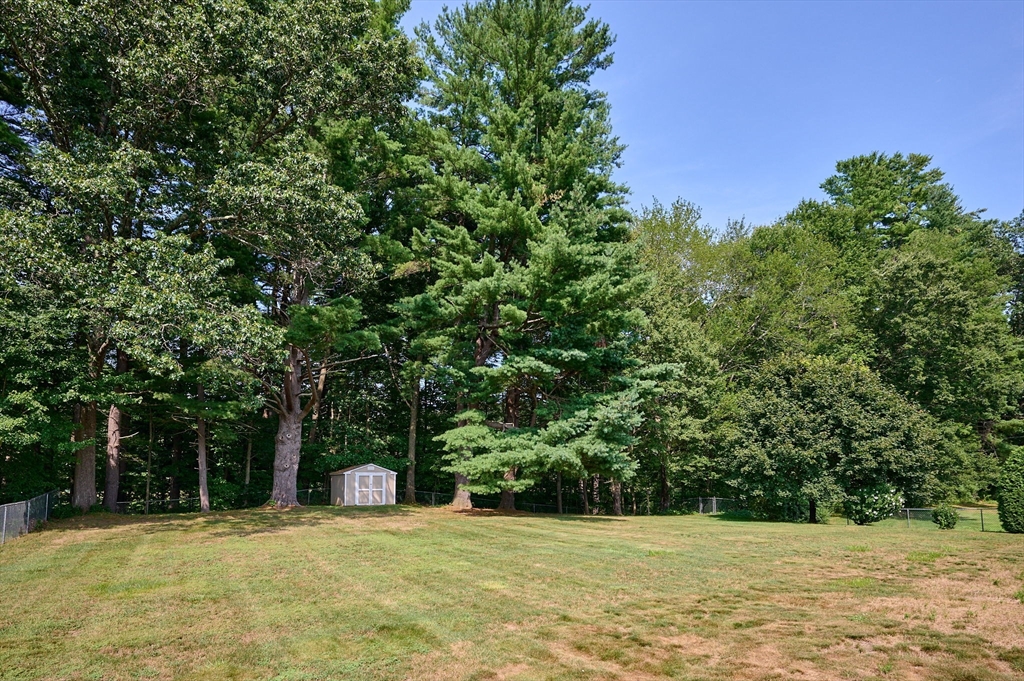 43 Loudville Road Easthampton, MA 01027 - Photo 25 of 34 a view of a field with a trees in the background