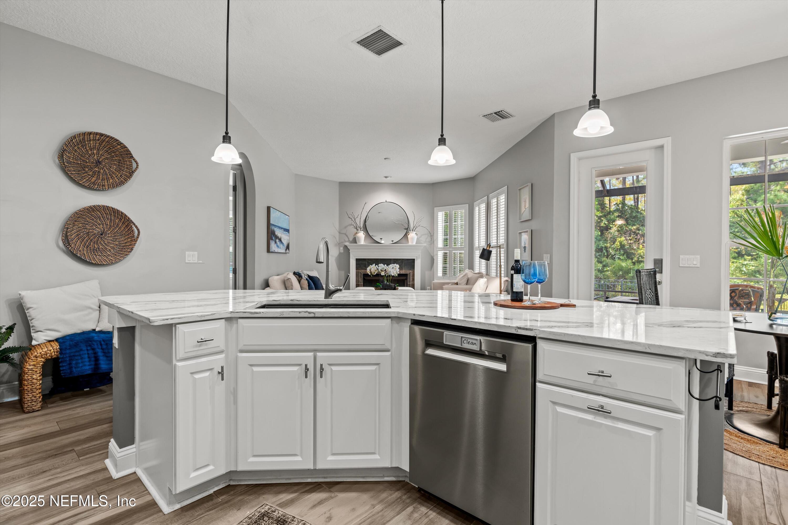 30 Pelican Pointe Road Ponte Vedra, FL 32081 - Photo 12 of 66 a kitchen with a sink cabinets and window