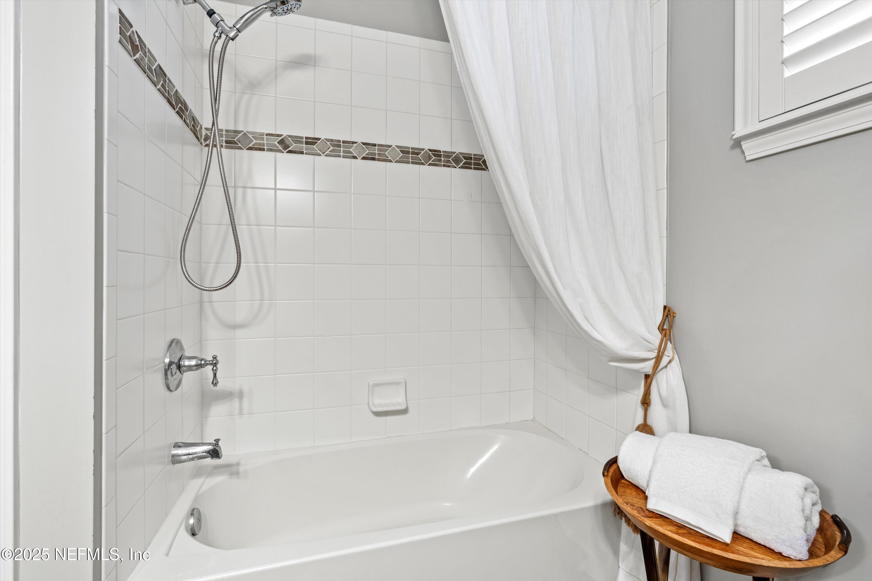 30 Pelican Pointe Road Ponte Vedra, FL 32081 - Photo 27 of 66 a bathroom with a white bath tub and a shower