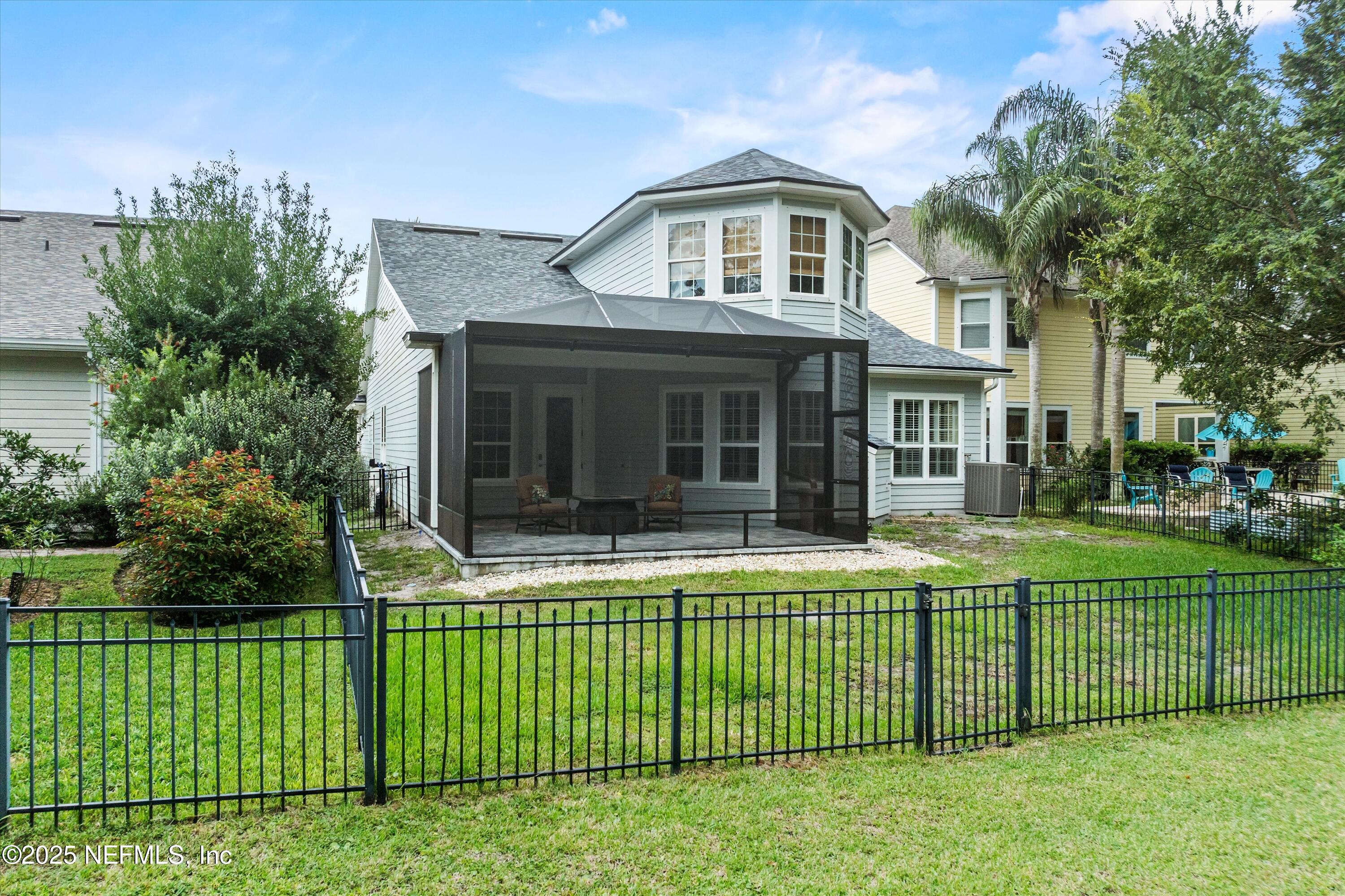 30 Pelican Pointe Road Ponte Vedra, FL 32081 - Photo 39 of 66 a front view of a house with a garden