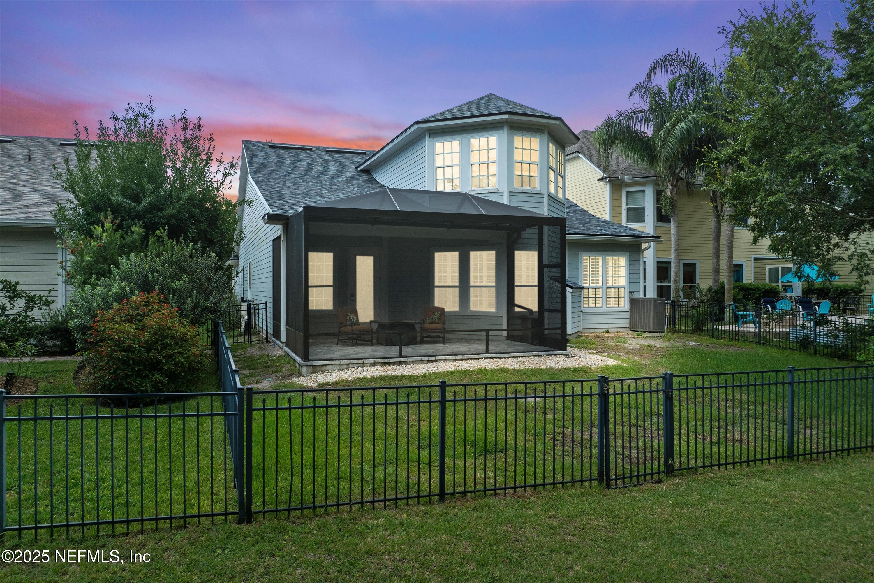 30 Pelican Pointe Road Ponte Vedra, FL 32081 - Photo 40 of 66 a front view of a house with a garden