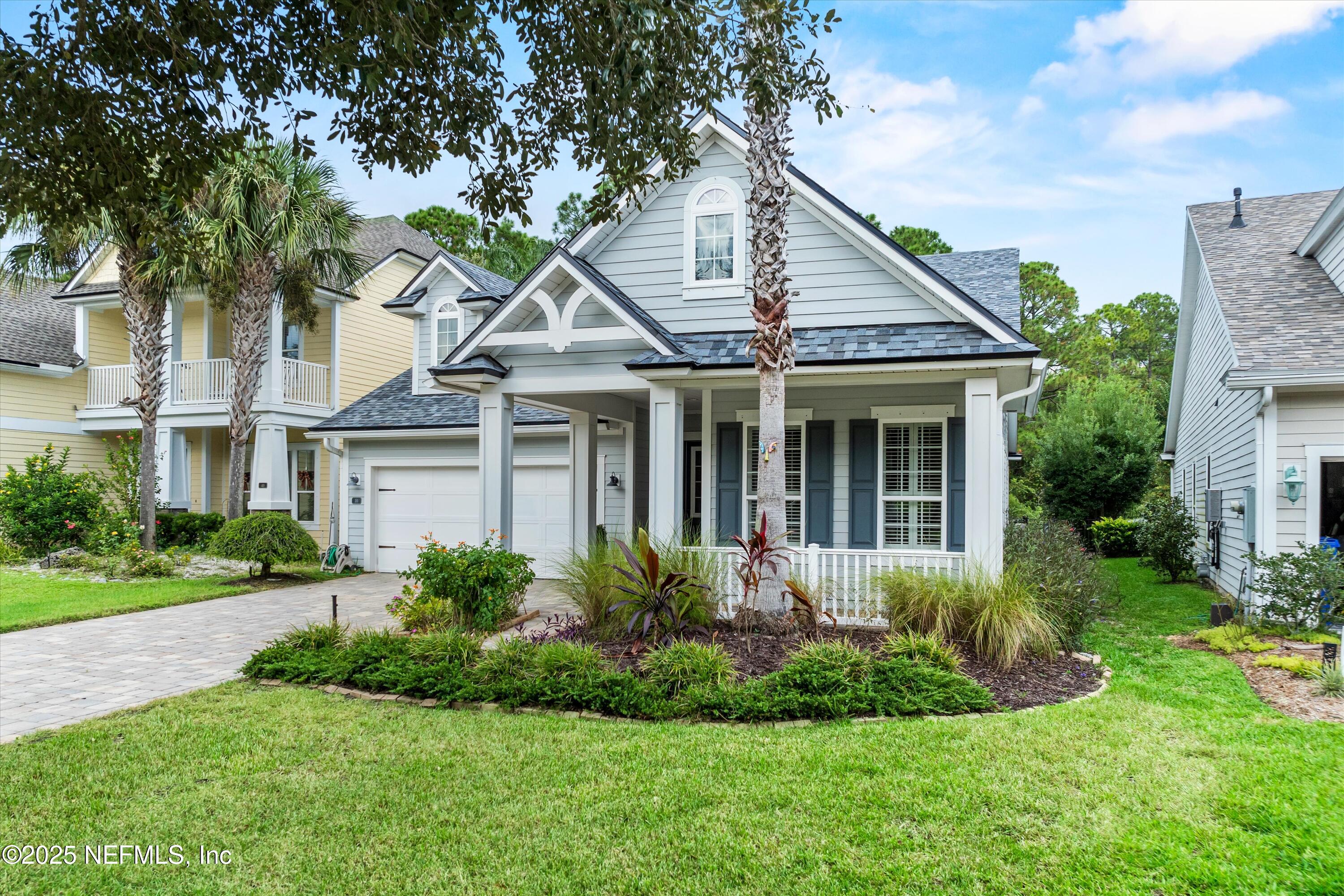 30 Pelican Pointe Road Ponte Vedra, FL 32081 - Photo 4 of 66 a view of a house with a yard and plants