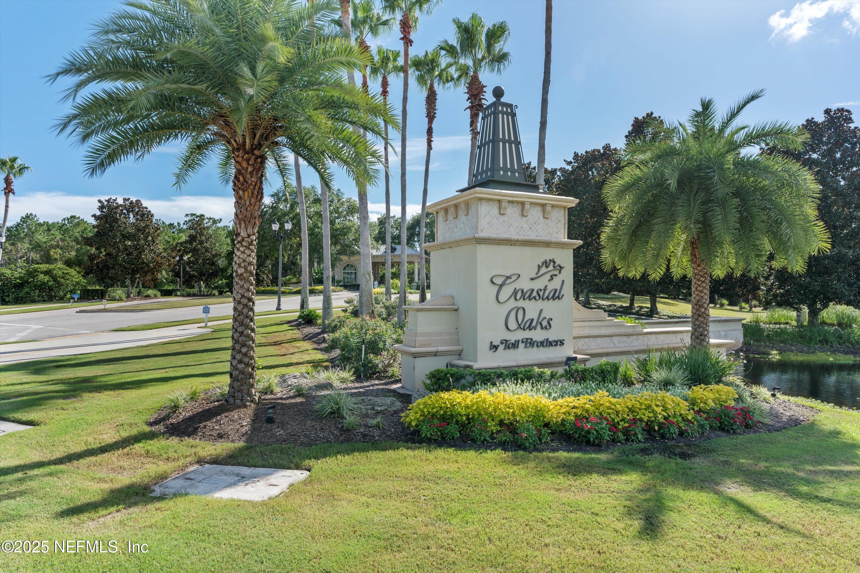 30 Pelican Pointe Road Ponte Vedra, FL 32081 - Photo 42 of 66 a front view of a house with swimming pool and a garden