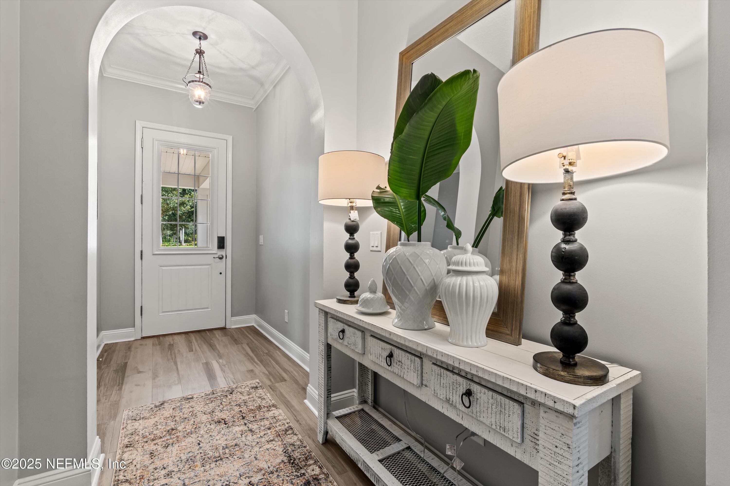 30 Pelican Pointe Road Ponte Vedra, FL 32081 - Photo 6 of 66 a bathroom with a sink mirror and vanity