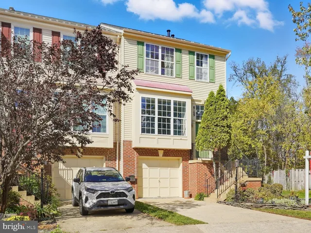 a car parked in front of a house