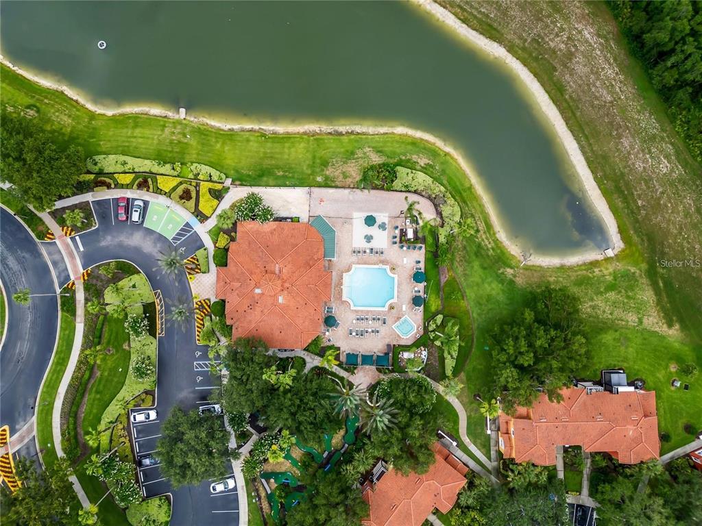 8411 Crystal Cove Loop Kissimmee, FL 34747 - Photo 43 of 43 an aerial view of a house with garden space sitting space and swimming pool