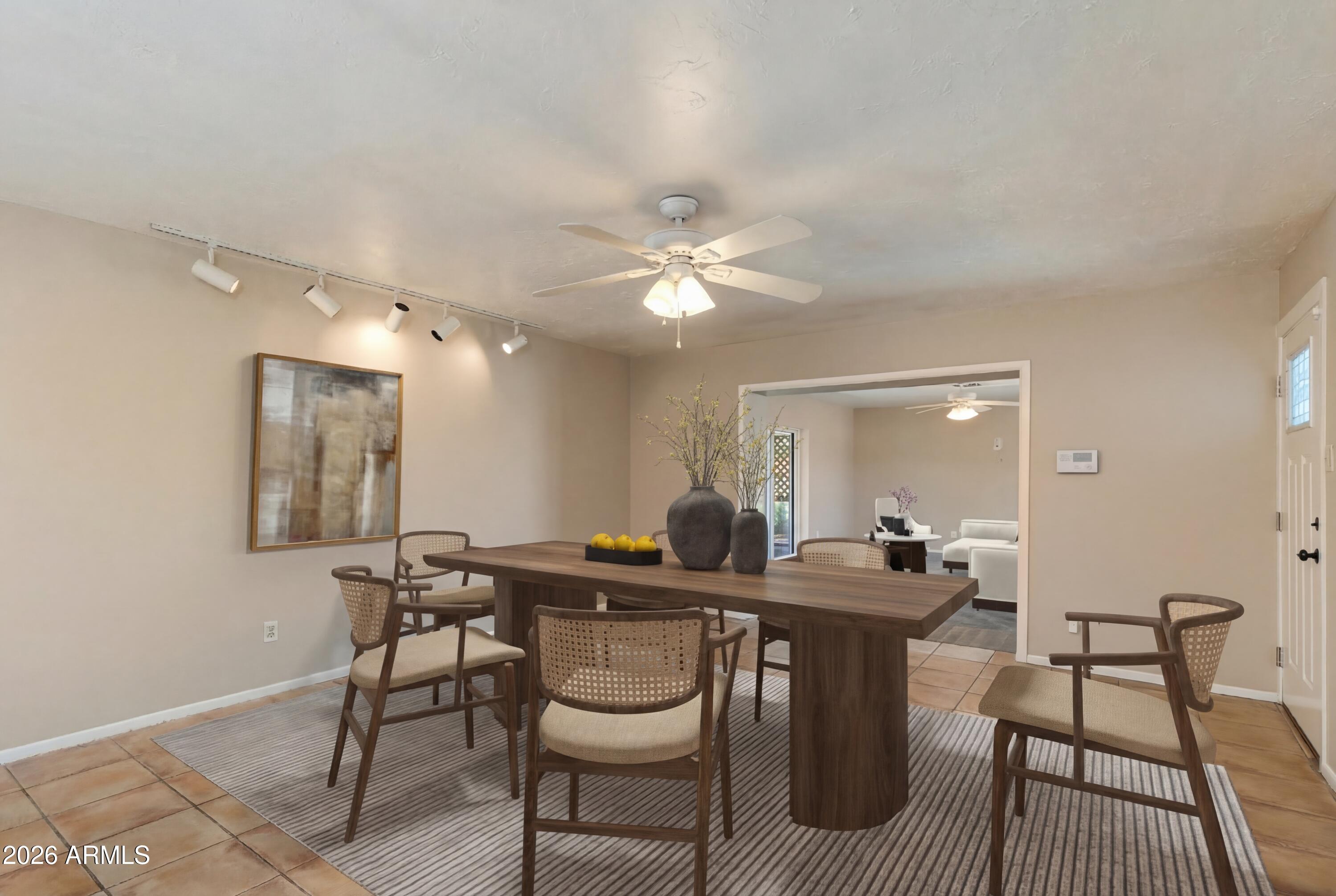 4415 East Chambers Street Phoenix, AZ 85040 - Photo 11 of 33 a dining room with furniture and window
