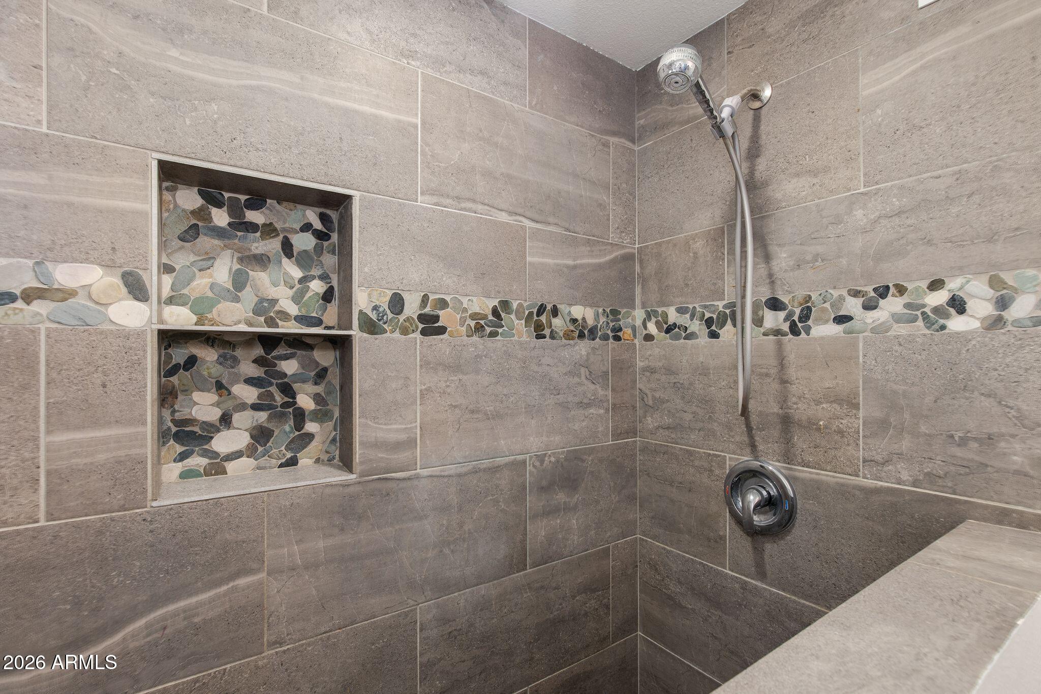 4415 East Chambers Street Phoenix, AZ 85040 - Photo 23 of 33 a bathroom with a shower