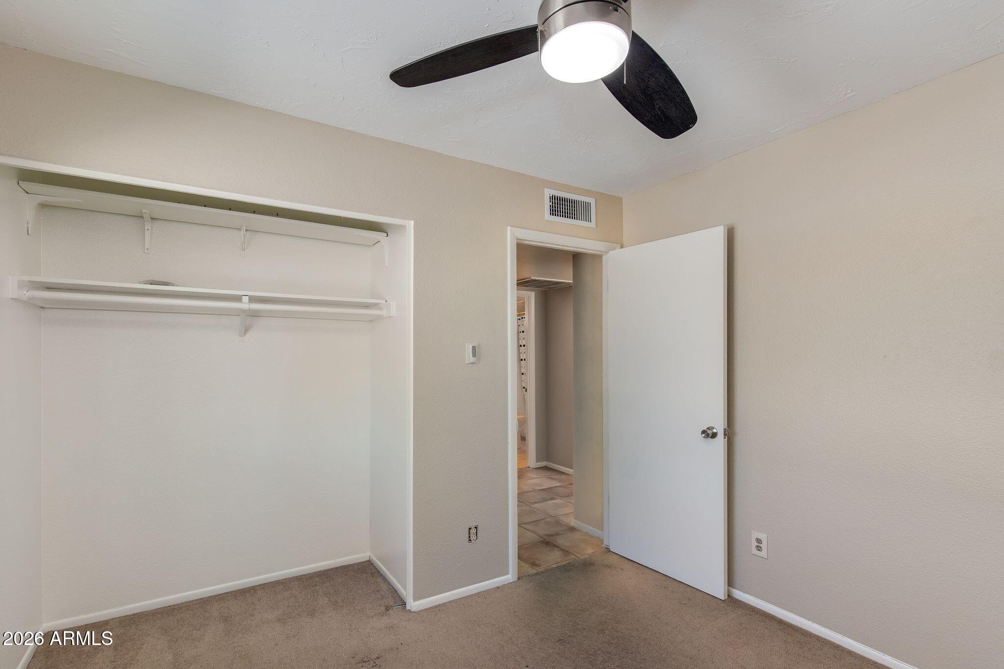 4415 East Chambers Street Phoenix, AZ 85040 - Photo 25 of 33 a view of a room with a ceiling fan