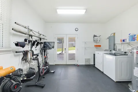 a view of a room with gym equipment