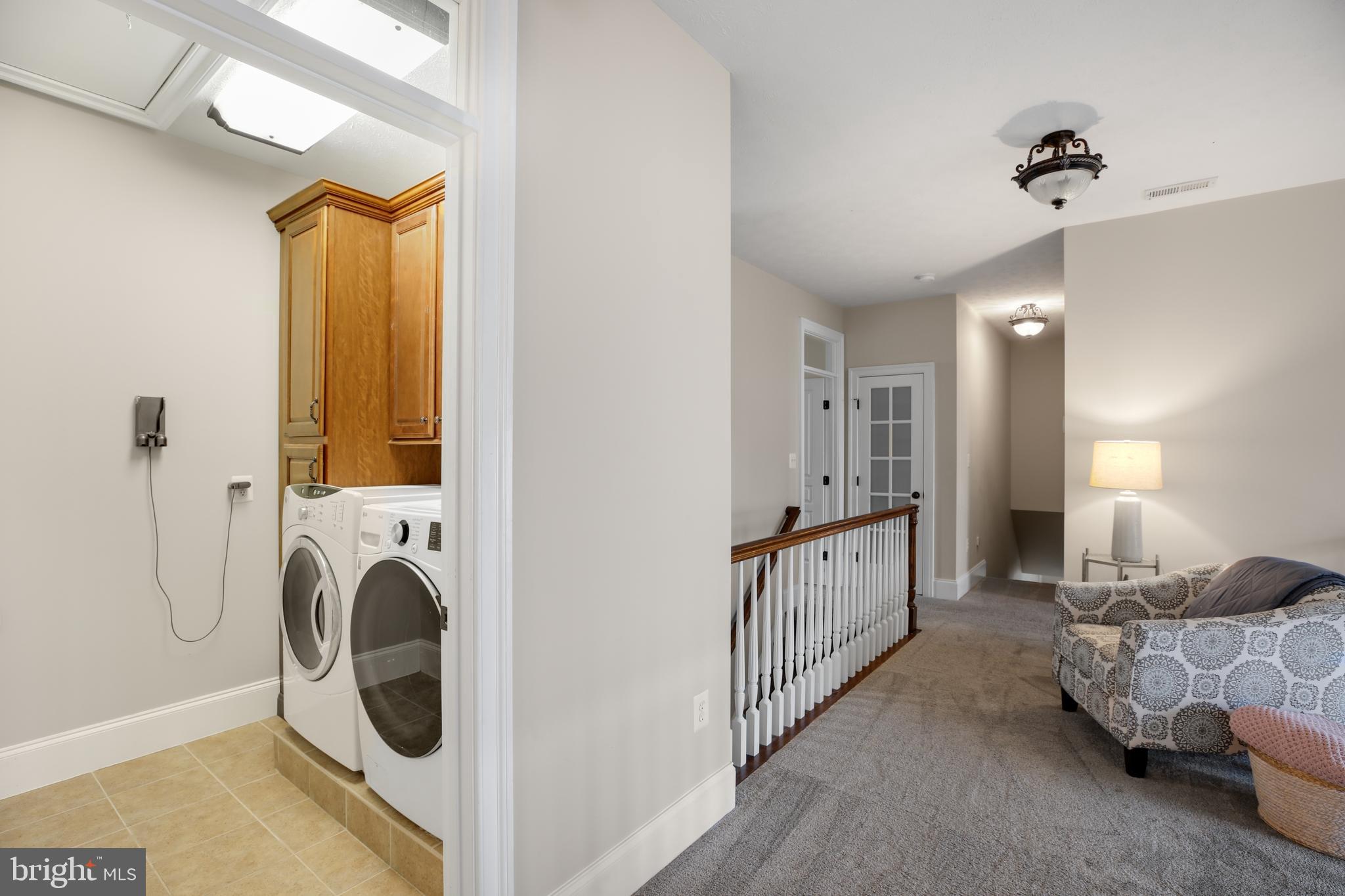 825 Camp Conoy Road Lusby, MD 20657 - Photo 45 of 73 a view of living room washer and dryer