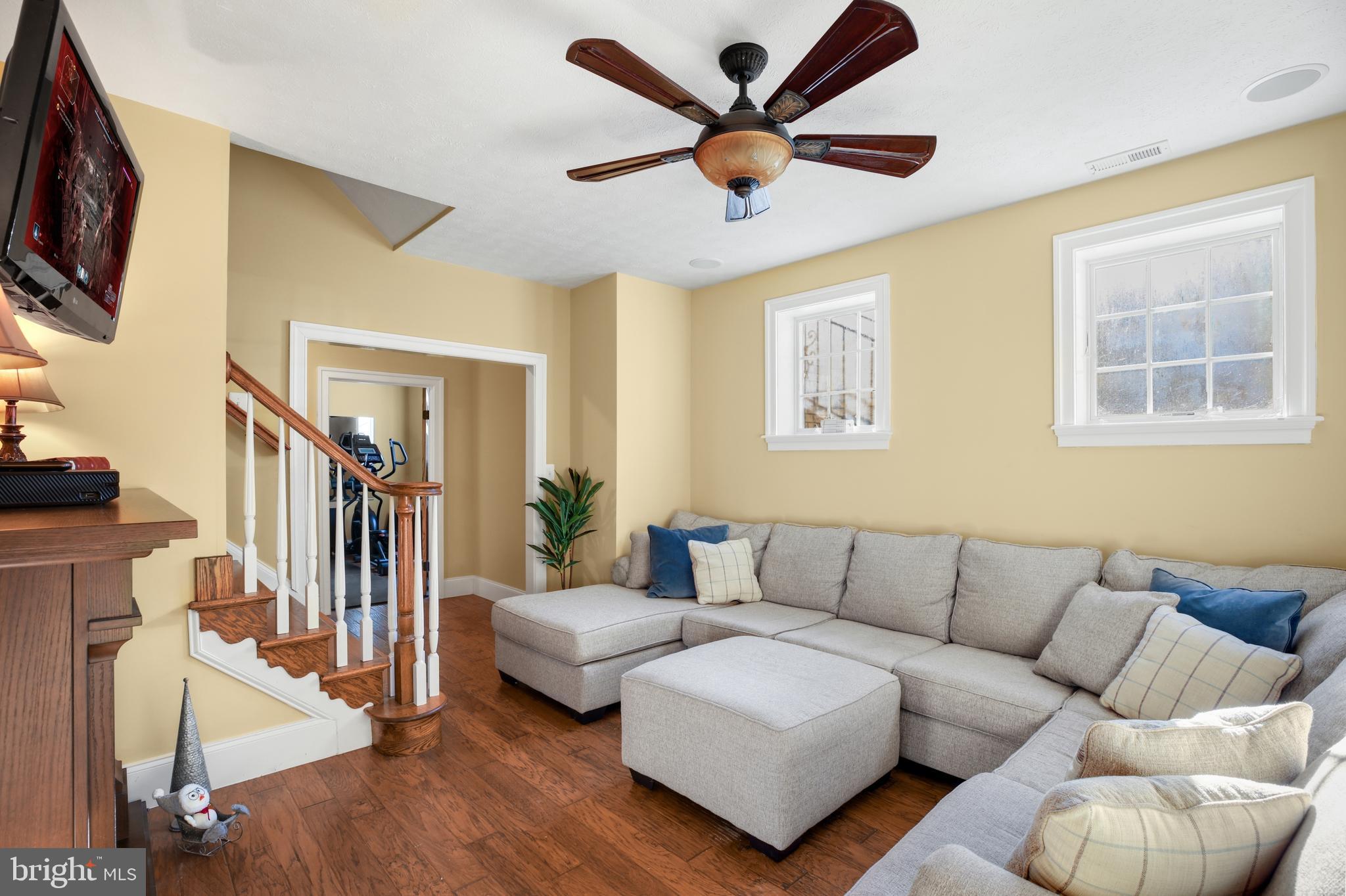 825 Camp Conoy Road Lusby, MD 20657 - Photo 54 of 73 a living room with furniture and a flat screen tv