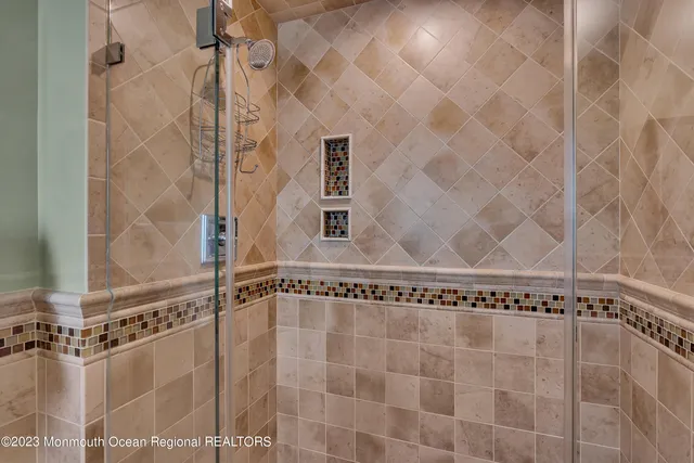 a close view of a shower in bathroom