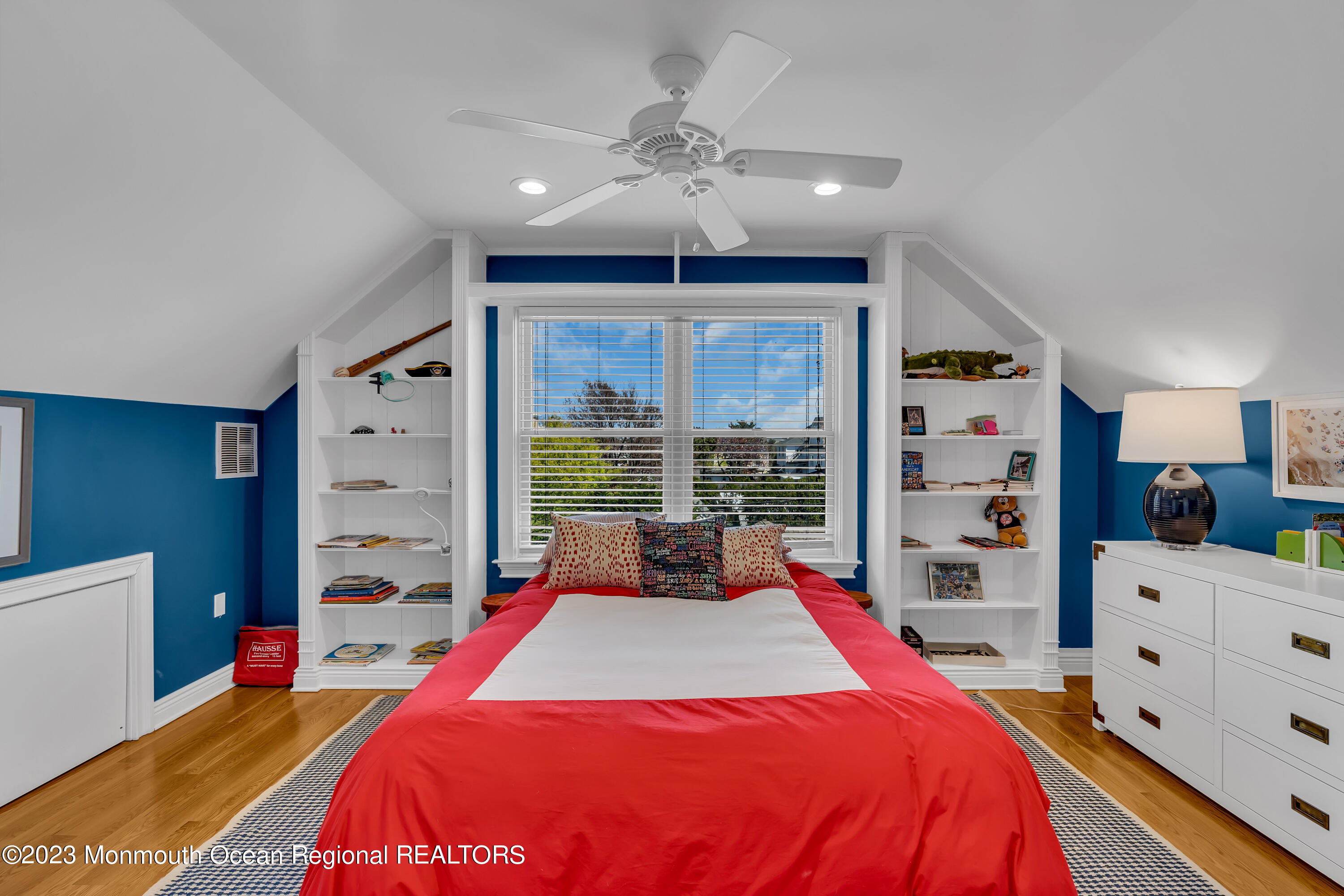 105 Beacon Boulevard Sea Girt, NJ 08750 - Photo 23 of 26 a bed room with a bed and a large window