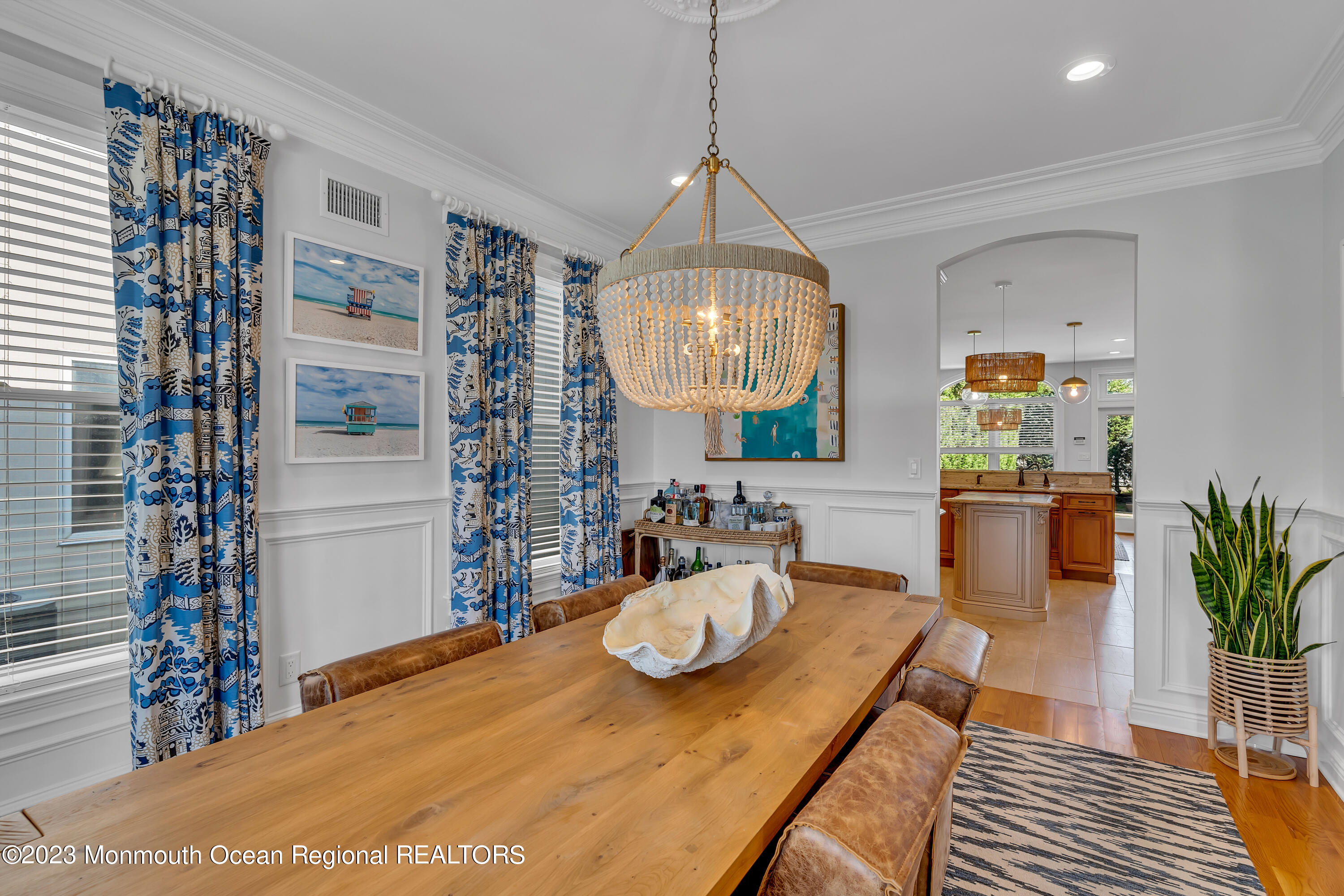 105 Beacon Boulevard Sea Girt, NJ 08750 - Photo 4 of 26 a view of a dining room with furniture window and wooden floor