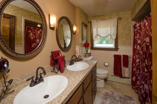328 Mendall Road Acushnet, MA 02743 - Photo 16 of 30 a bathroom with a double vanity sink and a mirror