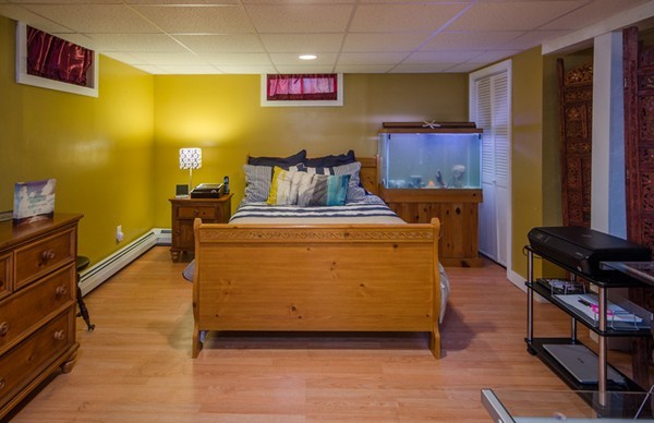 328 Mendall Road Acushnet, MA 02743 - Photo 20 of 30 a living room with furniture and a flat screen tv