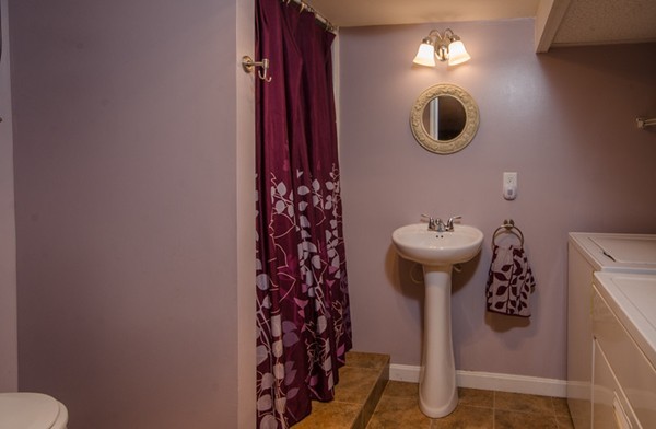 328 Mendall Road Acushnet, MA 02743 - Photo 21 of 30 a bathroom with a sink toilet and a mirror