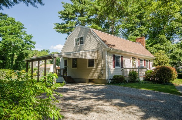 328 Mendall Road Acushnet, MA 02743 - Photo 26 of 30 a front view of a house with a garden