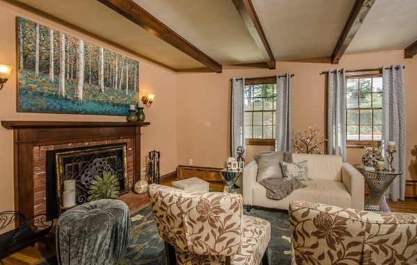 328 Mendall Road Acushnet, MA 02743 - Photo 6 of 30 a living room with furniture a fireplace and floor to ceiling windows