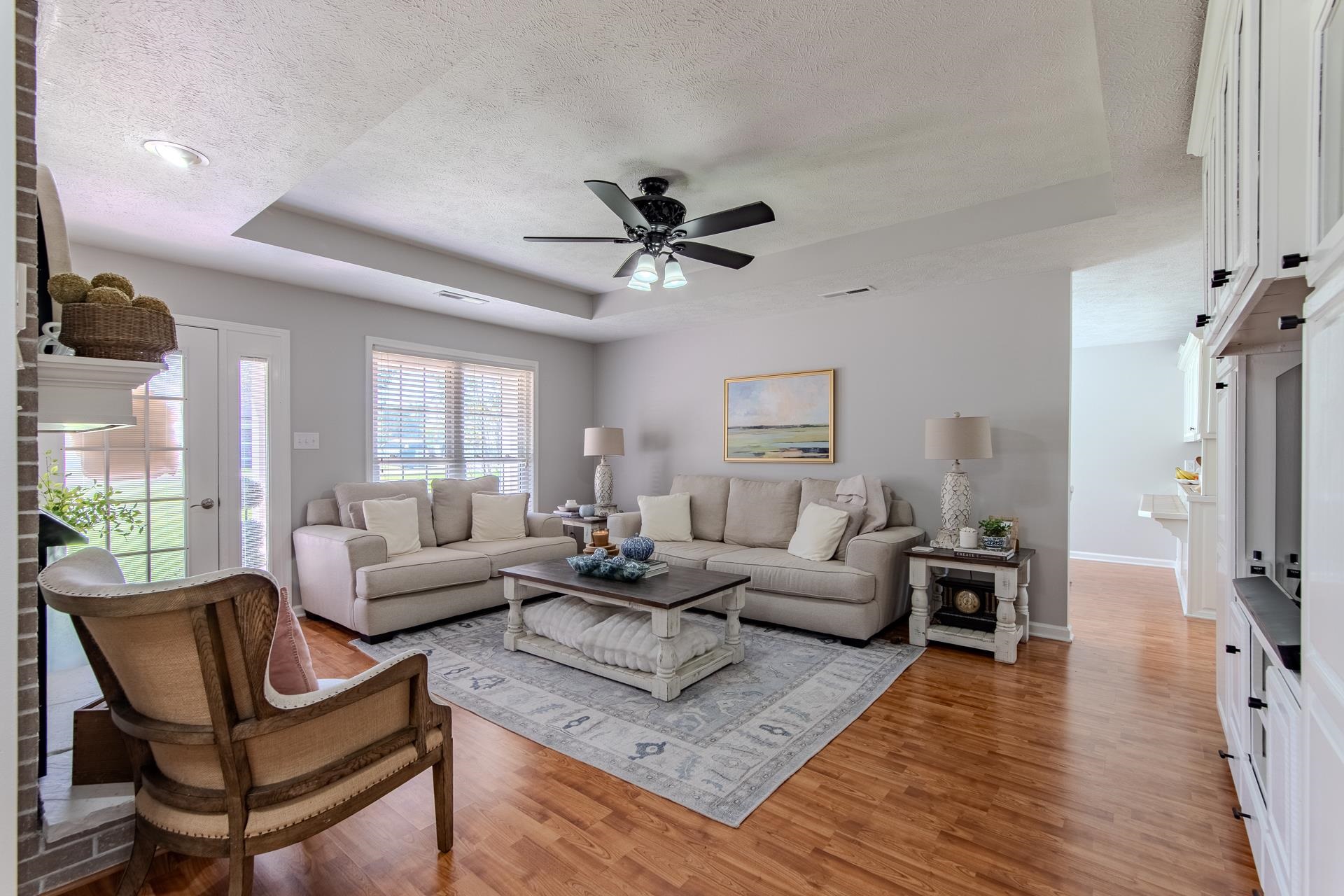 224 Willow Drive Adamsville, TN 38310 - Photo 34 of 40 a living room with furniture and a large window