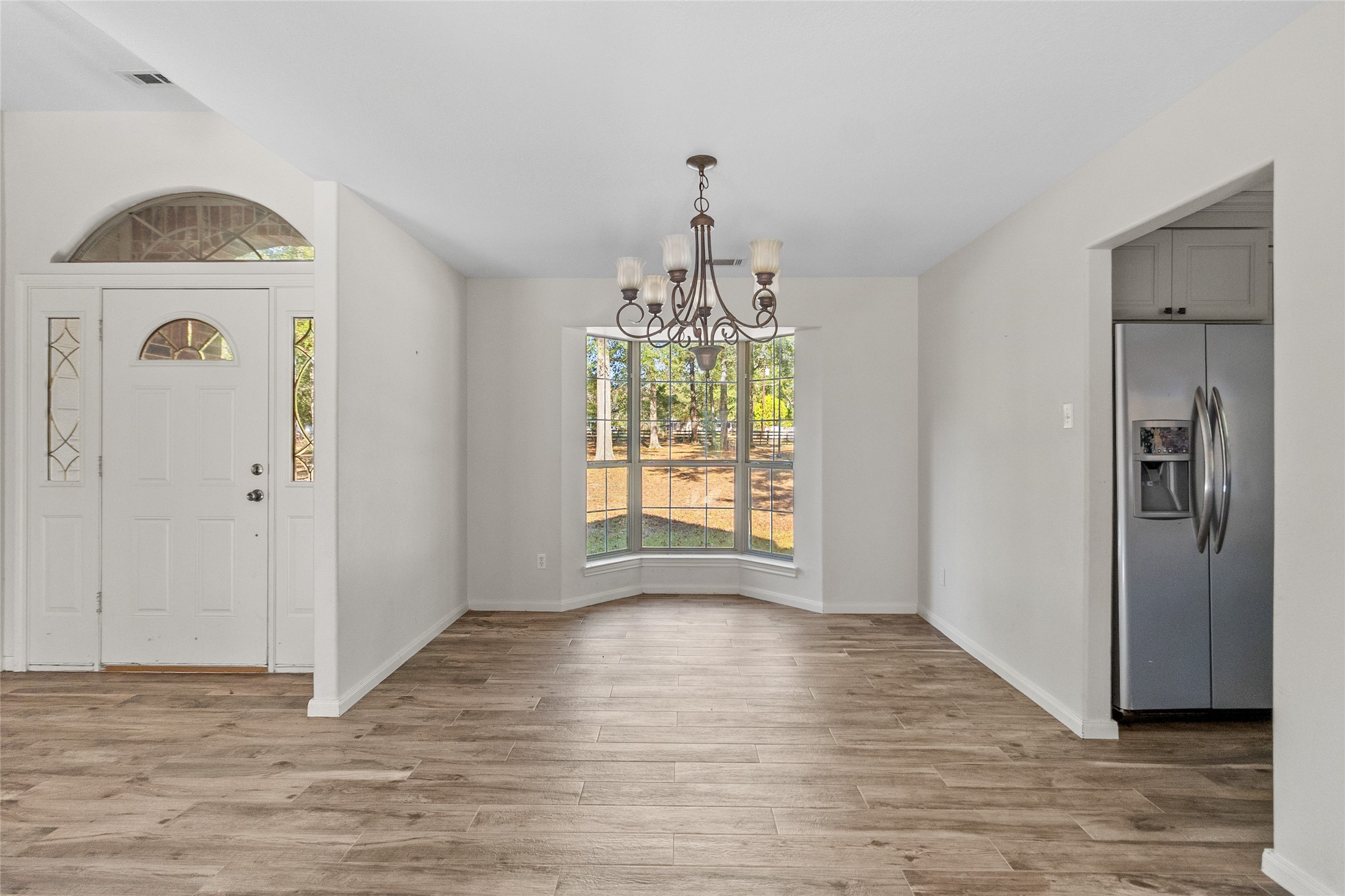 11270 Summit Drive Conroe, TX 77303 - Photo 13 of 35 a view of livingroom with natural light