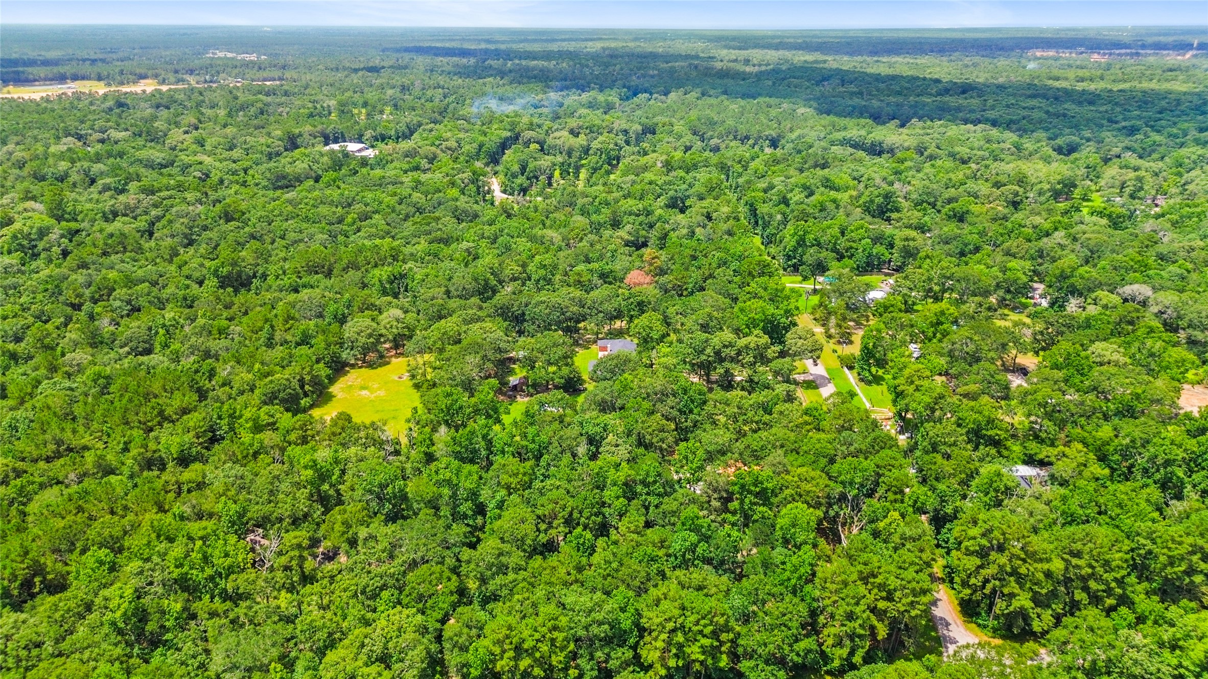 11270 Summit Drive Conroe, TX 77303 - Photo 31 of 35 a view of a outdoor space and a lake view