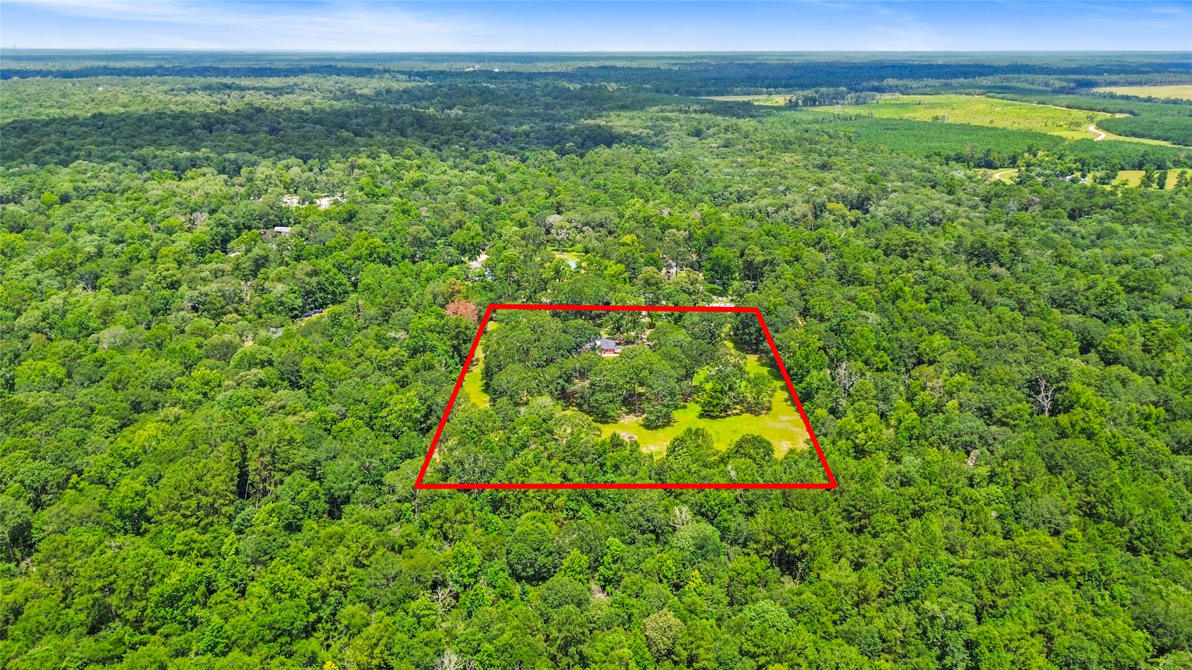 11270 Summit Drive Conroe, TX 77303 - Photo 35 of 35 a view of an outdoor space and a yard