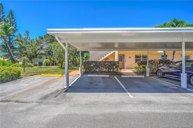 a view of storage and utility room with washer and dryer
