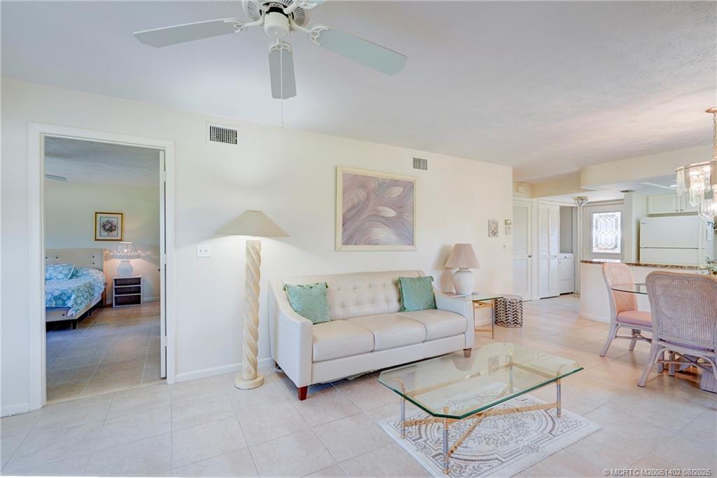 2950 Southeast Ocean Boulevard, Unit 1211 Stuart, FL 34996 - Photo 25 of 61 a living room with furniture and a view of living room