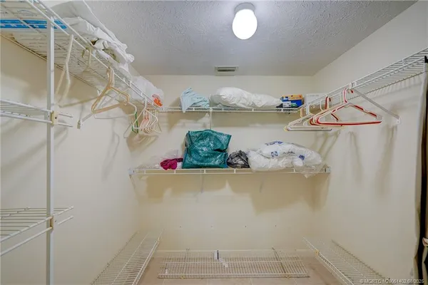 a view of a swimming pool and a yard