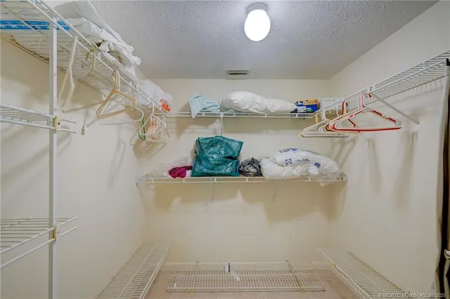 a view of a swimming pool and a yard